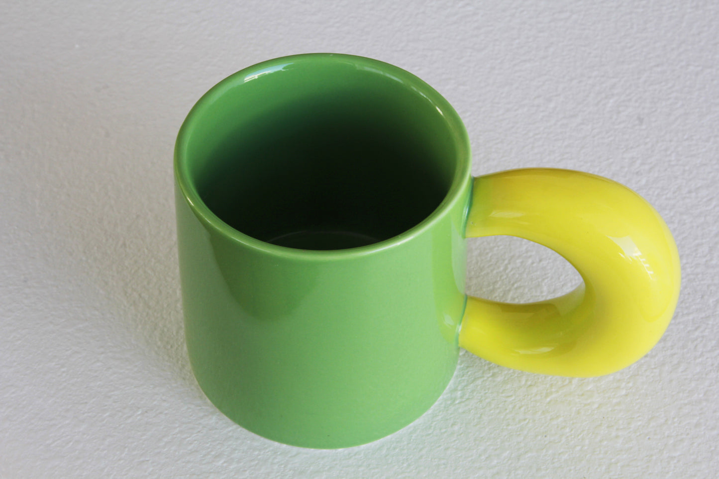 taza bootsy verde + amarillo